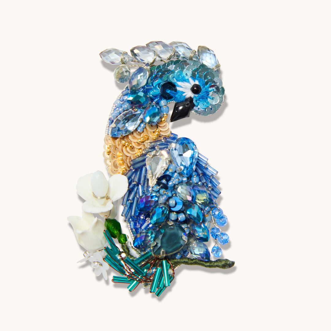 peacock brooch blue