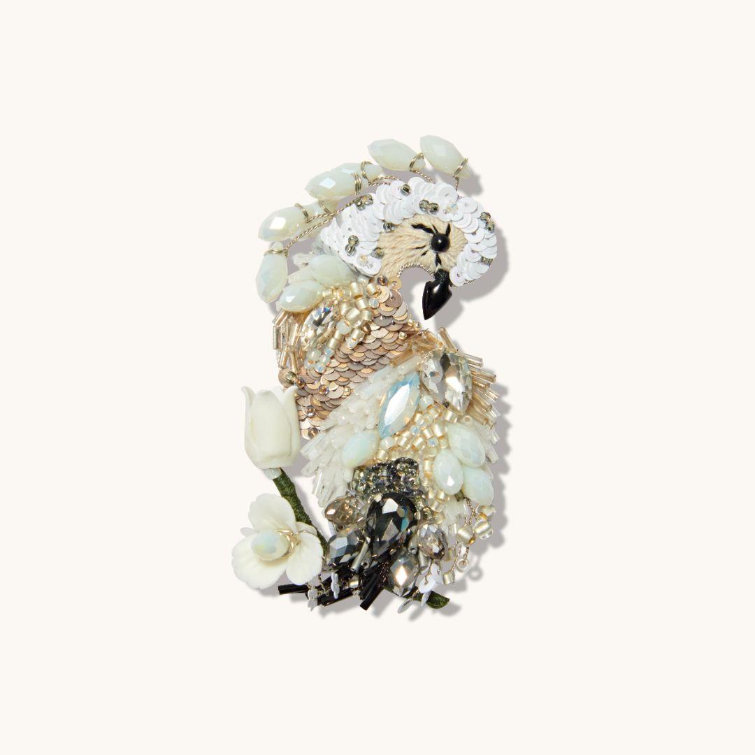 peacock brooch white